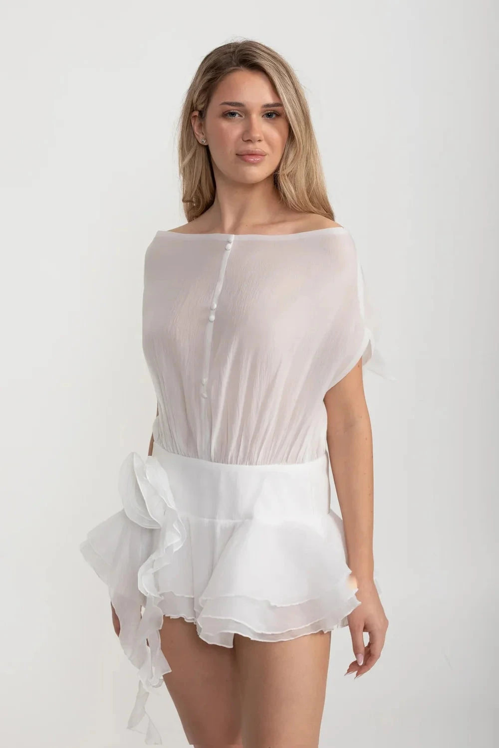 Elegant Mini Dress With Peplum Hem And Rosette Waist Embellishment - White