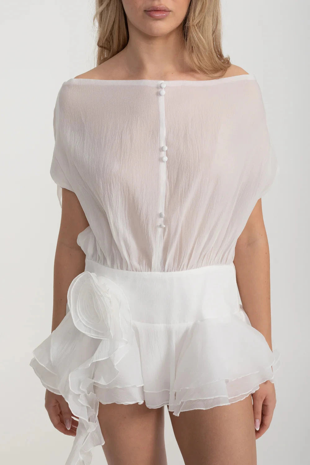 Elegant Mini Dress With Peplum Hem And Rosette Waist Embellishment - White