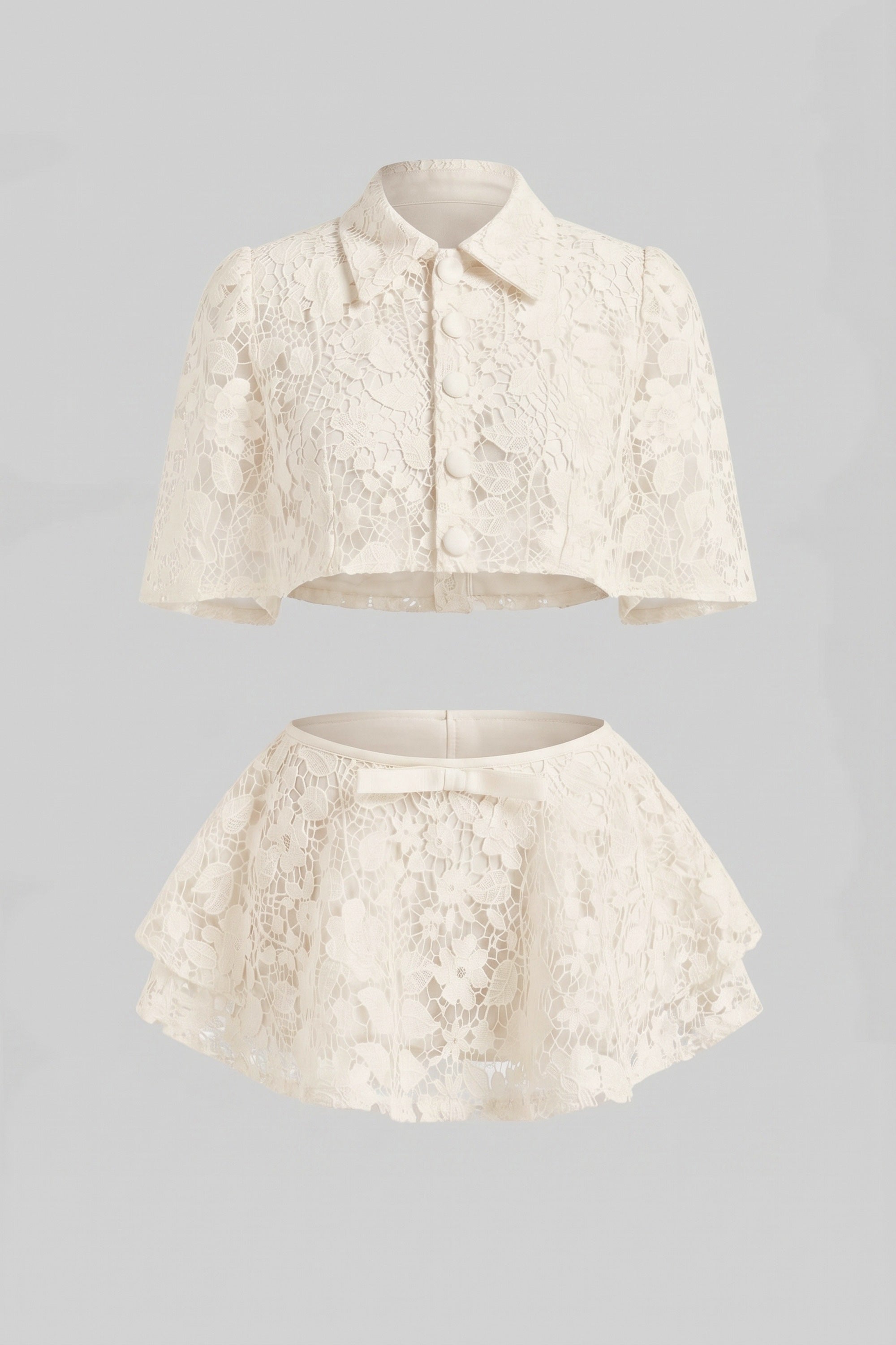 طقم Lace Co-Ord مع كاب بأزرار وتنورة ميني بفيونكة - White