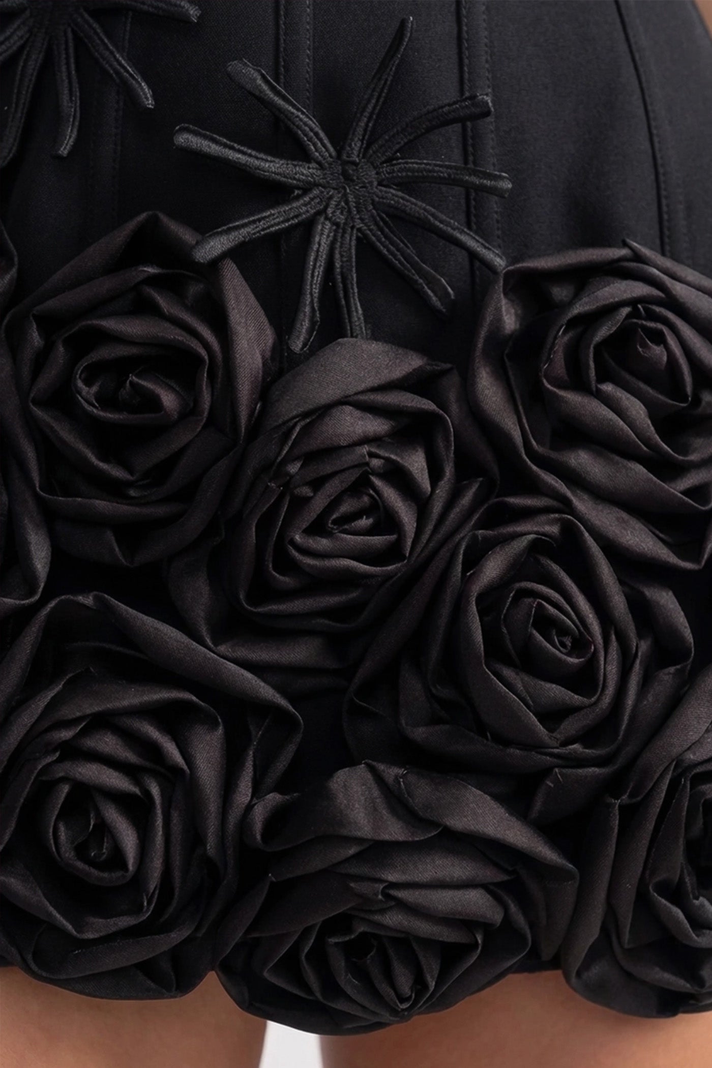 Corset Mini Dress with Sculpted Floral Hem – Black